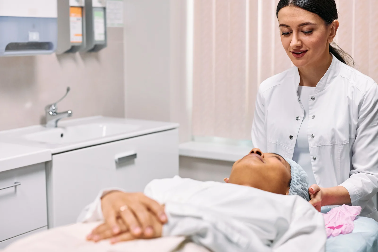 Doctor consulting with a client before treatment